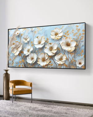 Elegant Blossoms: White Flowers on Blue Canvas – styled in a modern room setting